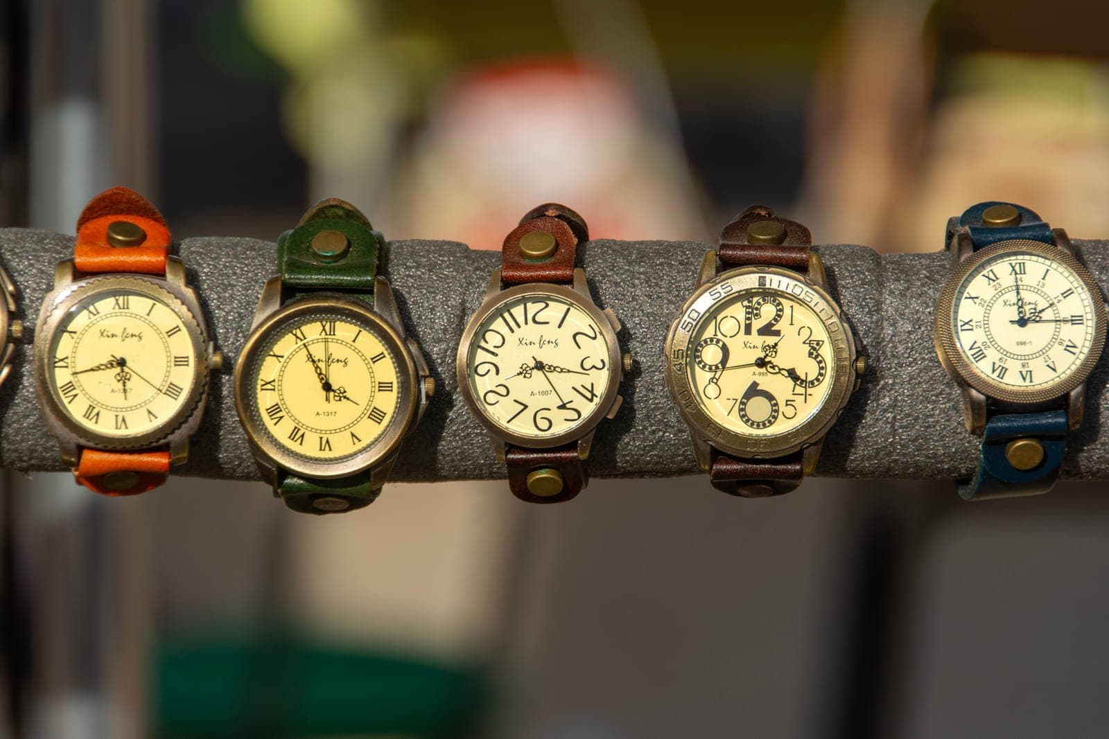 An assortment of leather watch straps laid out